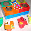 Развивающая игрушка для детей до года - коробочка со стаканчиками-вкладышами